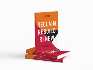Book titled 'Reclaim Rebuild Renew' on a gray background